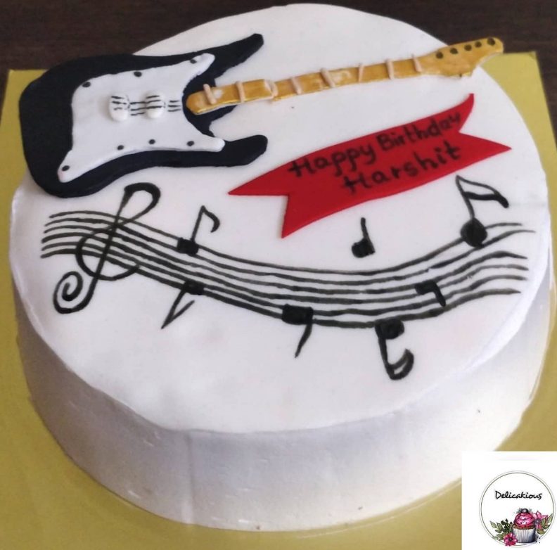 Music guitar themed cake