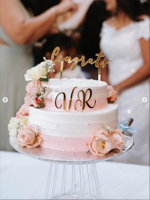 Two-tier wedding cake with roses